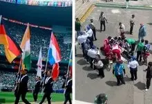 یک هوادار در جریان دیدار افتتاحیه درگذشت